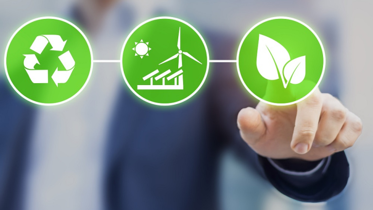 Student stands in front of the smart board in the classroom and gives presentation to his fellow students at the hotel school maastricht.