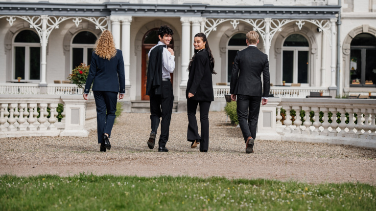 Students walking towards the castle.